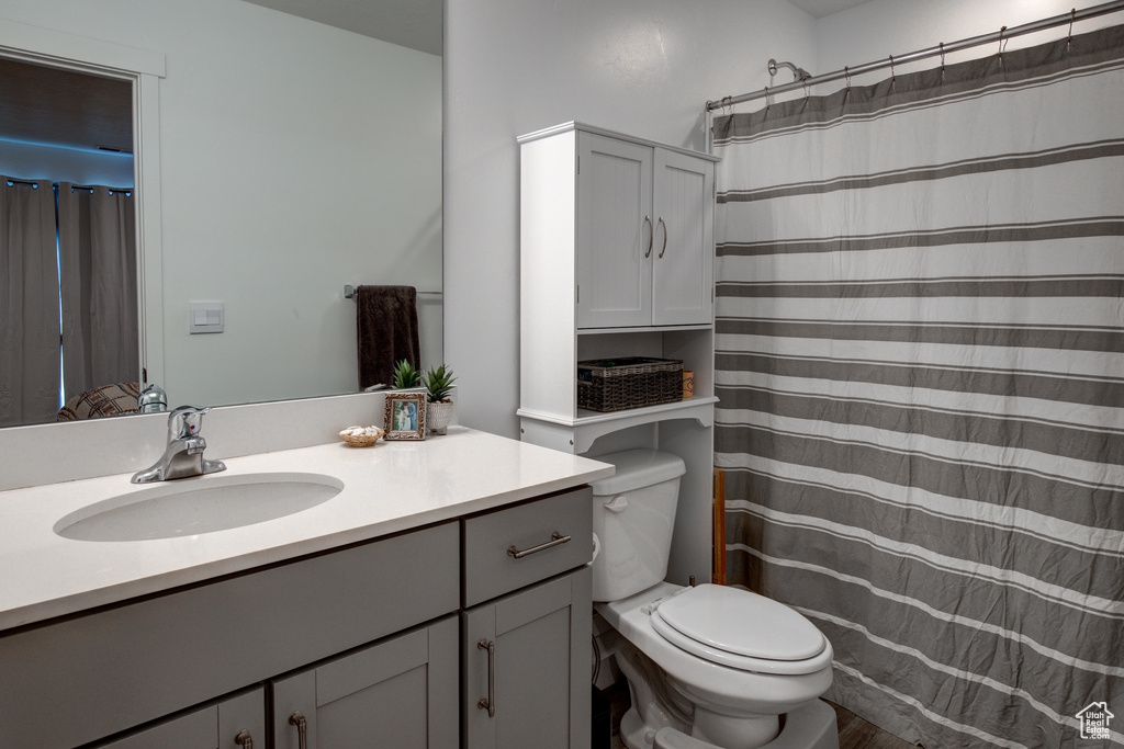 Bathroom with vanity and toilet