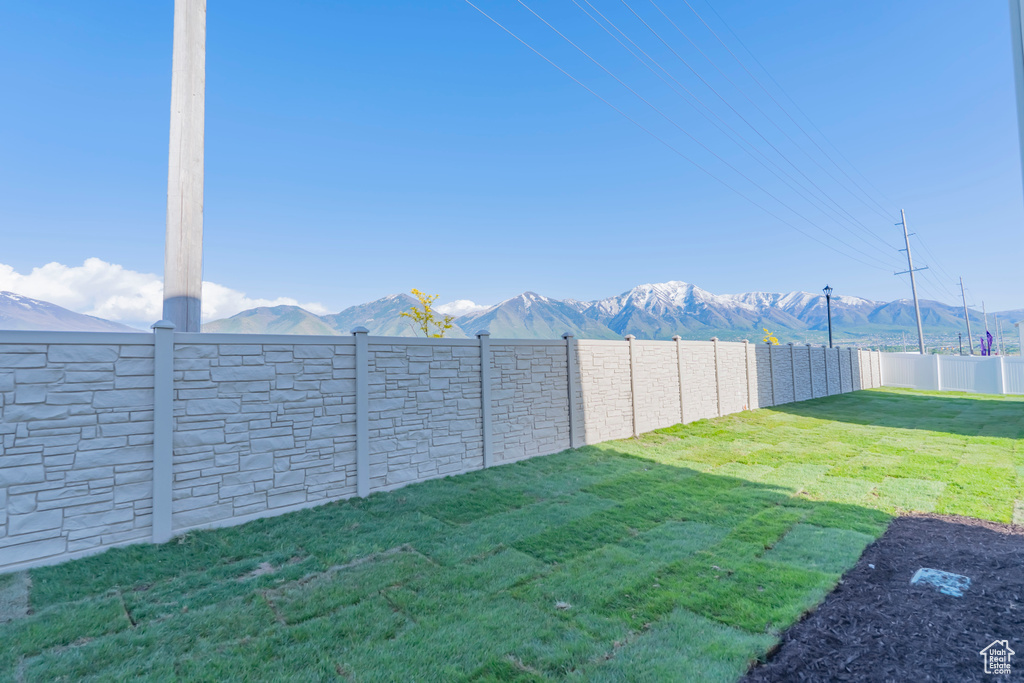 View of yard with a mountain view