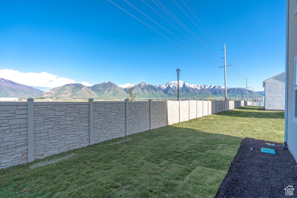 View of yard with a mountain view