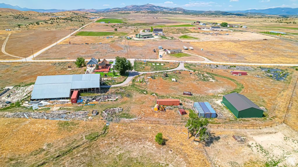 Drone / aerial view with a mountain view and a rural view