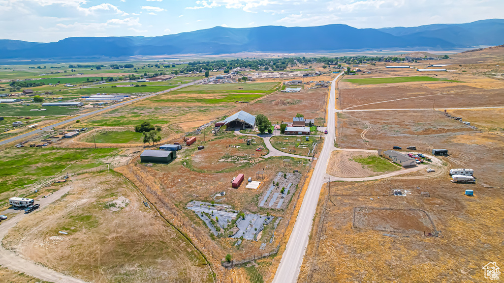 Birds eye view of property featuring a rural view and a mountain view