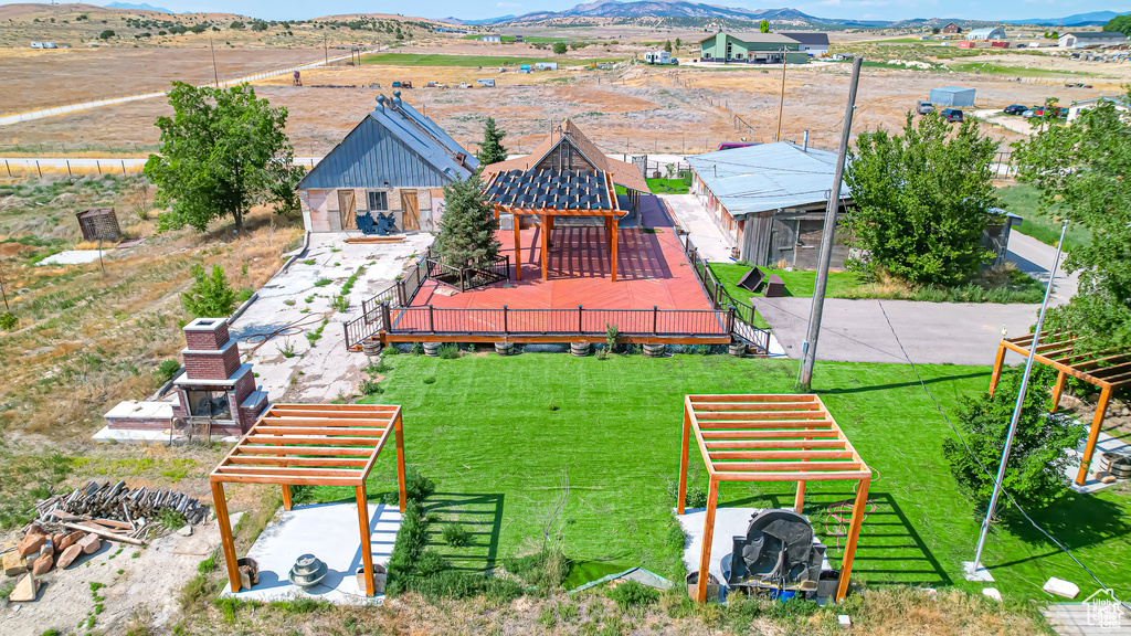 Drone / aerial view featuring a mountain view