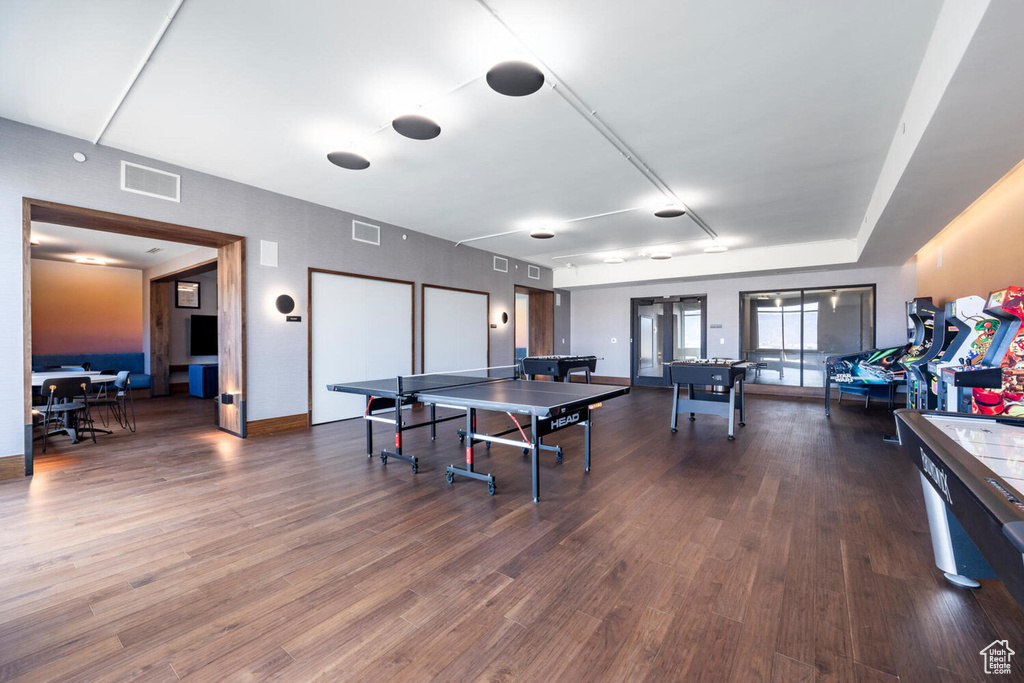 Game room featuring visible vents and dark wood finished floors
