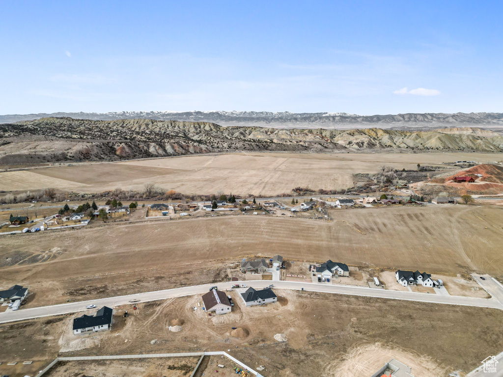 Aerial view featuring a rural view and a mountain view