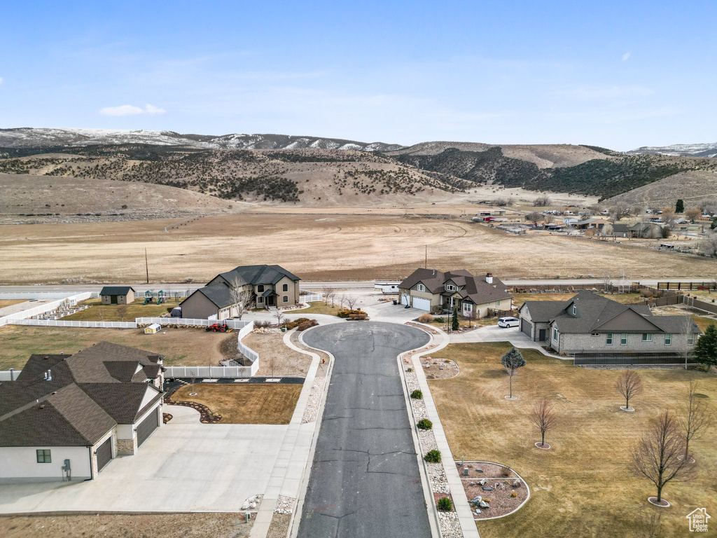Drone / aerial view with a residential view and a mountain view