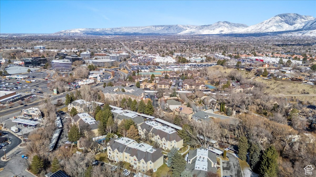 Drone / aerial view featuring a residential view and a mountain view