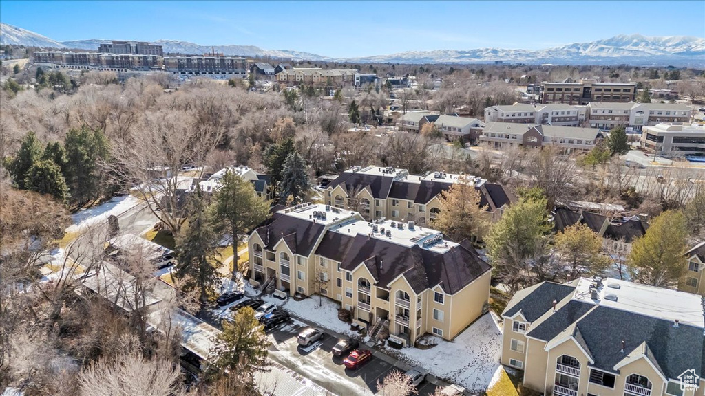 Birds eye view of property with a residential view and a mountain view