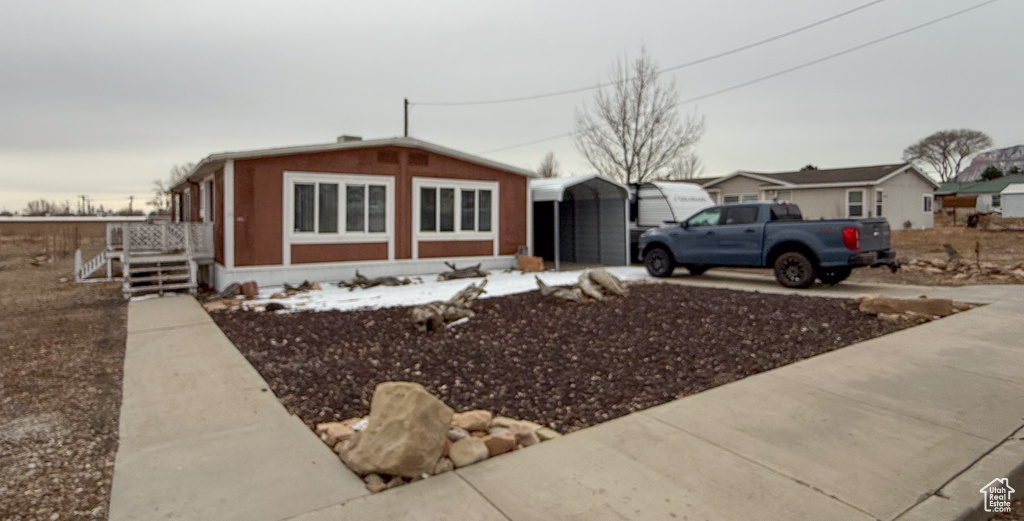 Bungalow-style house with driveway