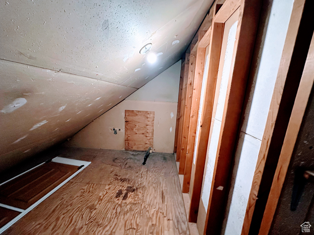 Bonus room featuring vaulted ceiling