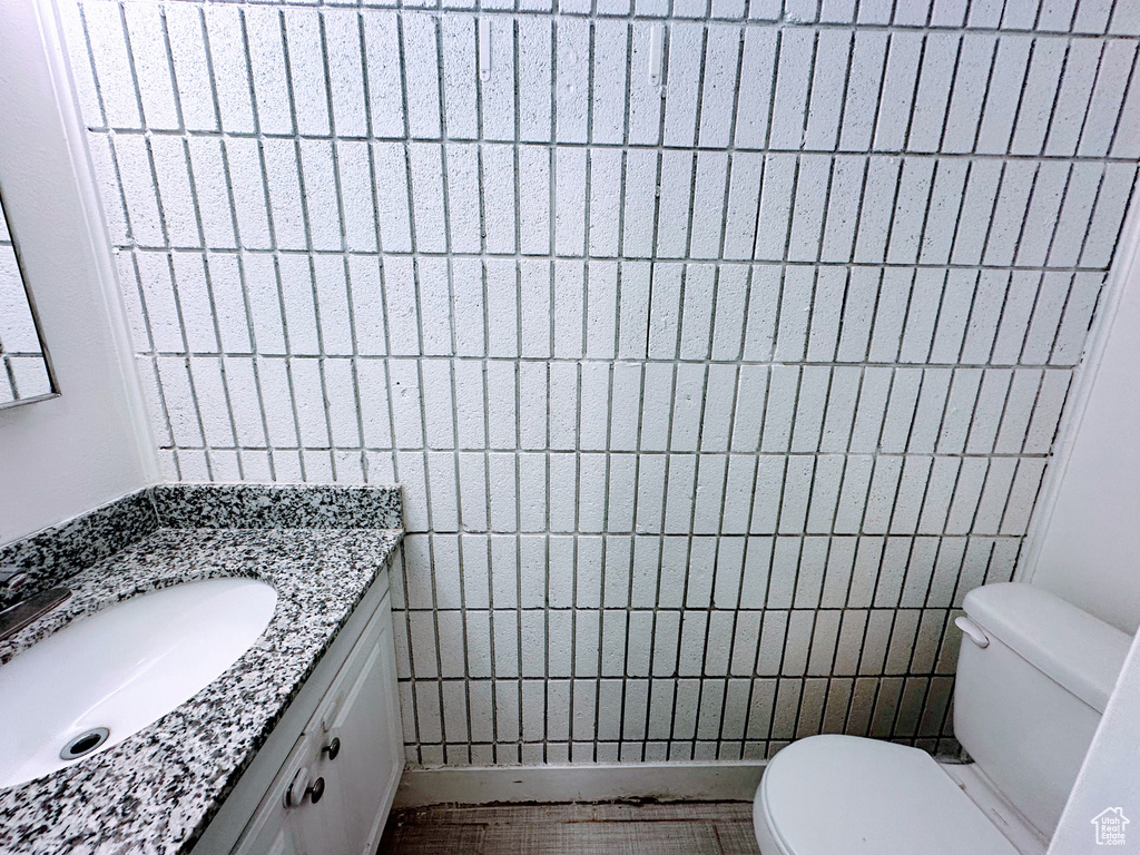 Bathroom with vanity and toilet