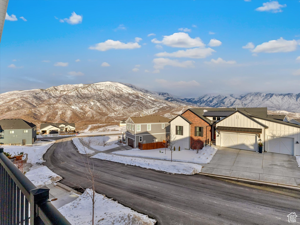 Exterior space with a residential view and a mountain view