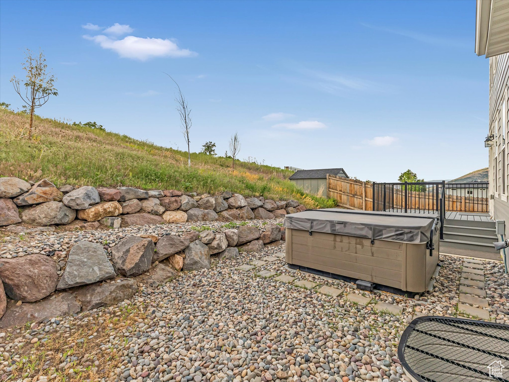 View of yard featuring a hot tub