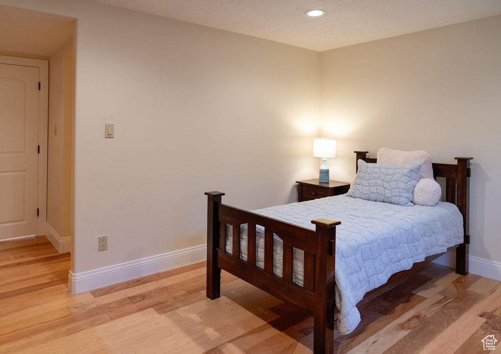 Bedroom featuring light wood-type flooring