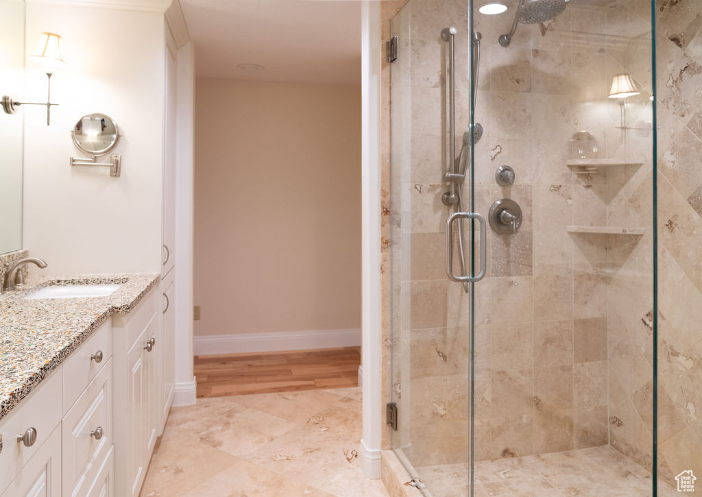 Bathroom with vanity and walk in shower