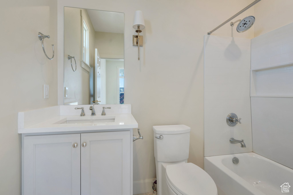Bathroom featuring vanity and bathtub / shower combination
