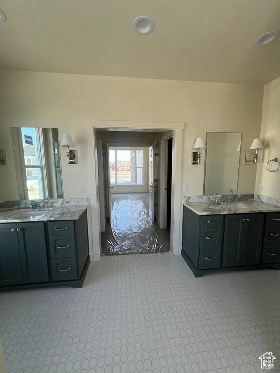 Full bathroom with two vanities