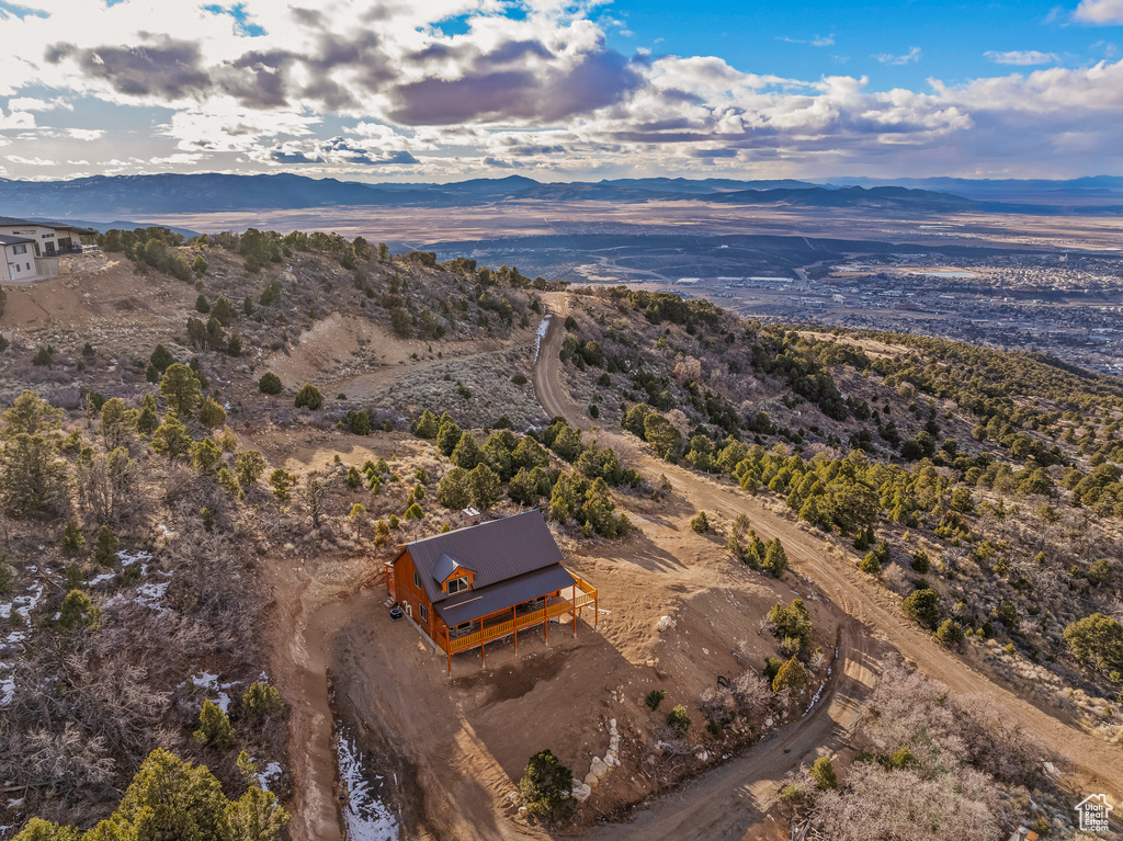 Aerial view at dusk featuring a mountain view