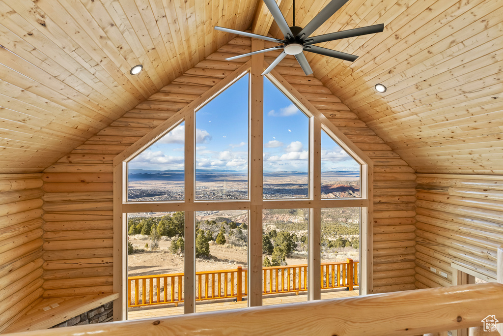 Bonus room with wood ceiling, log walls, and vaulted ceiling