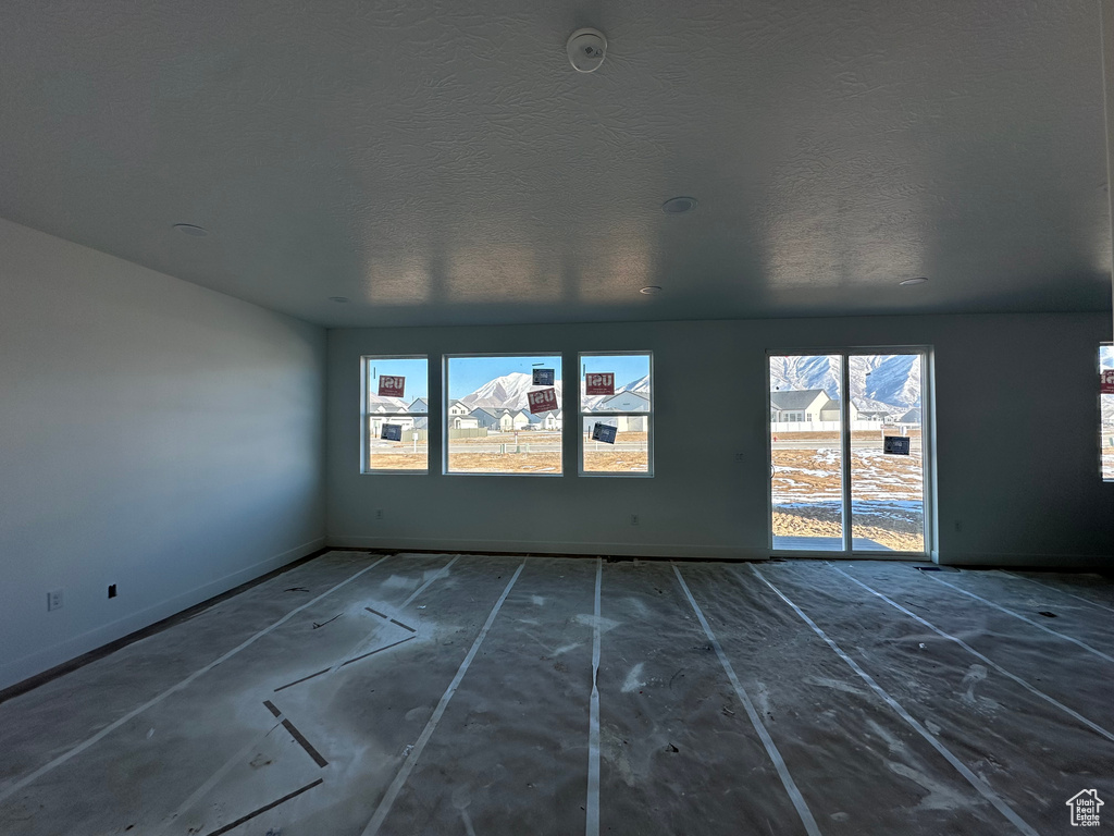 Spare room featuring a textured ceiling
