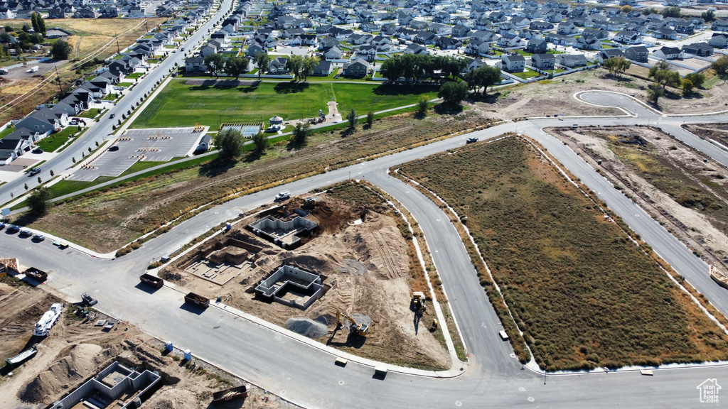 Birds eye view of property with a residential view