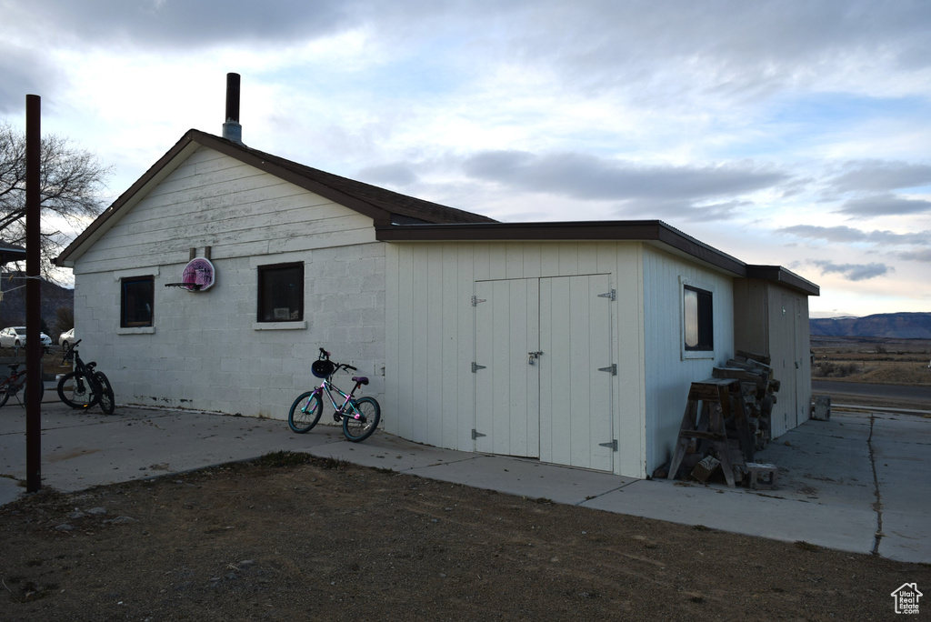 View of home's exterior with a mountain view