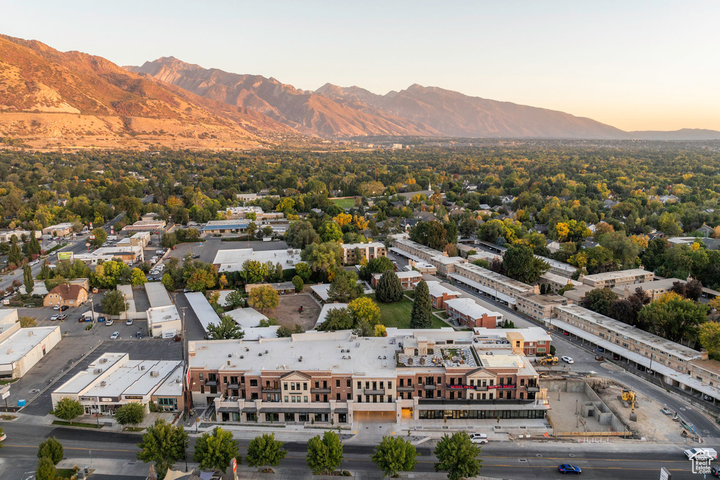 Aerial view at dusk featuring a mountain view