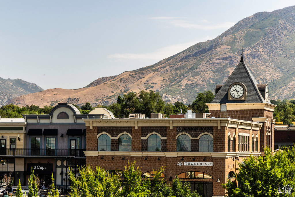 View of property with a mountain view