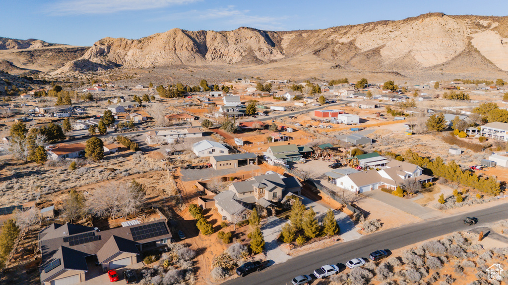 Property view of mountains with a residential view