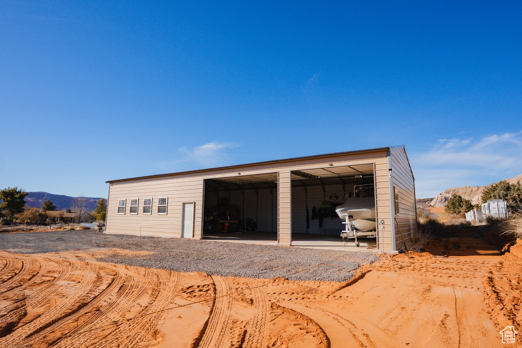 Detached garage with a mountain view