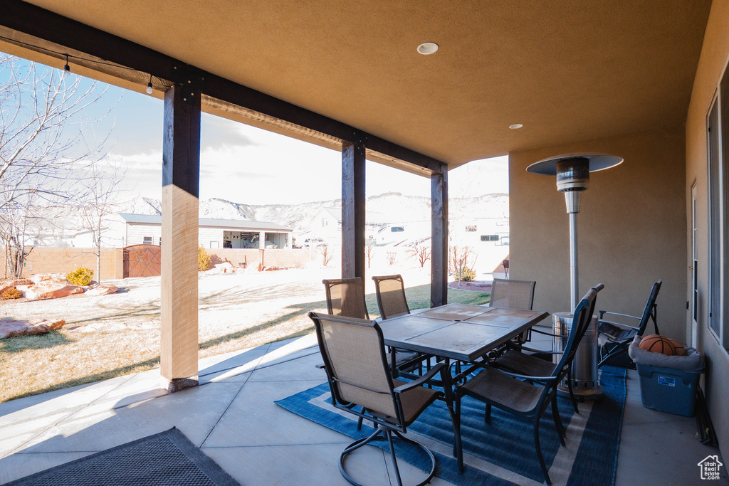 View of patio / terrace with outdoor dining space and fence