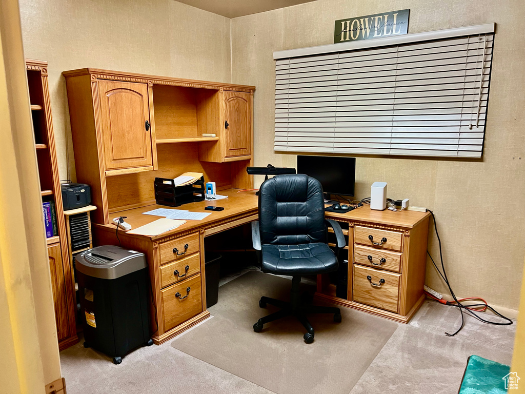 Office with light colored carpet