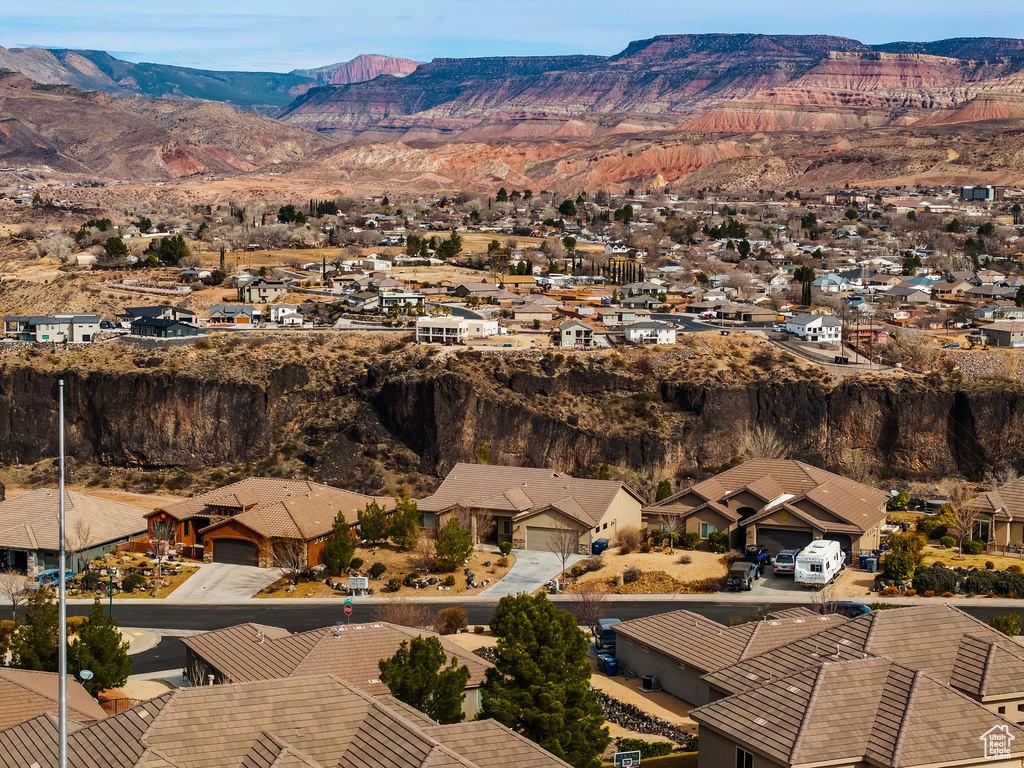 Birds eye view of property featuring a residential view and a mountain view