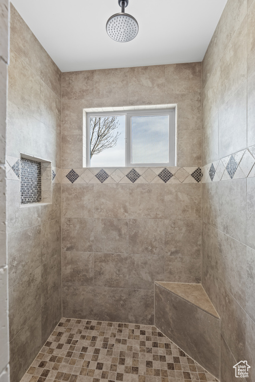 Bathroom with tiled shower