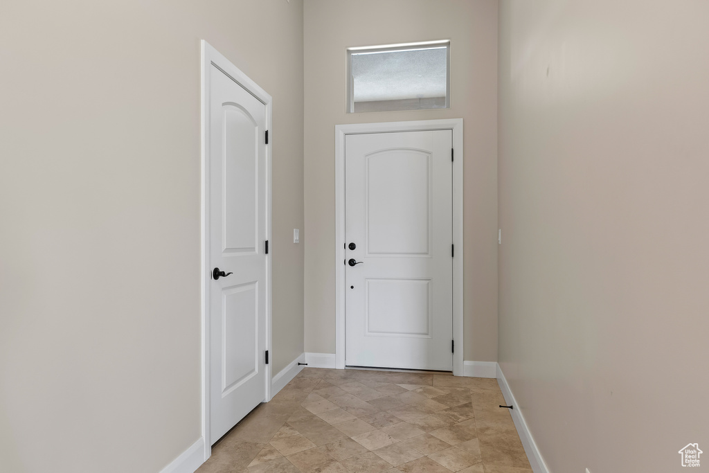 Entryway featuring baseboards