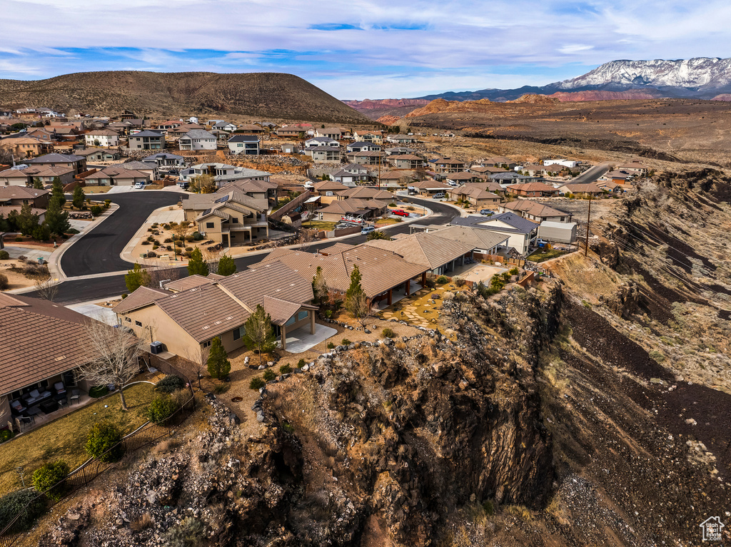 Drone / aerial view featuring a residential view and a mountain view