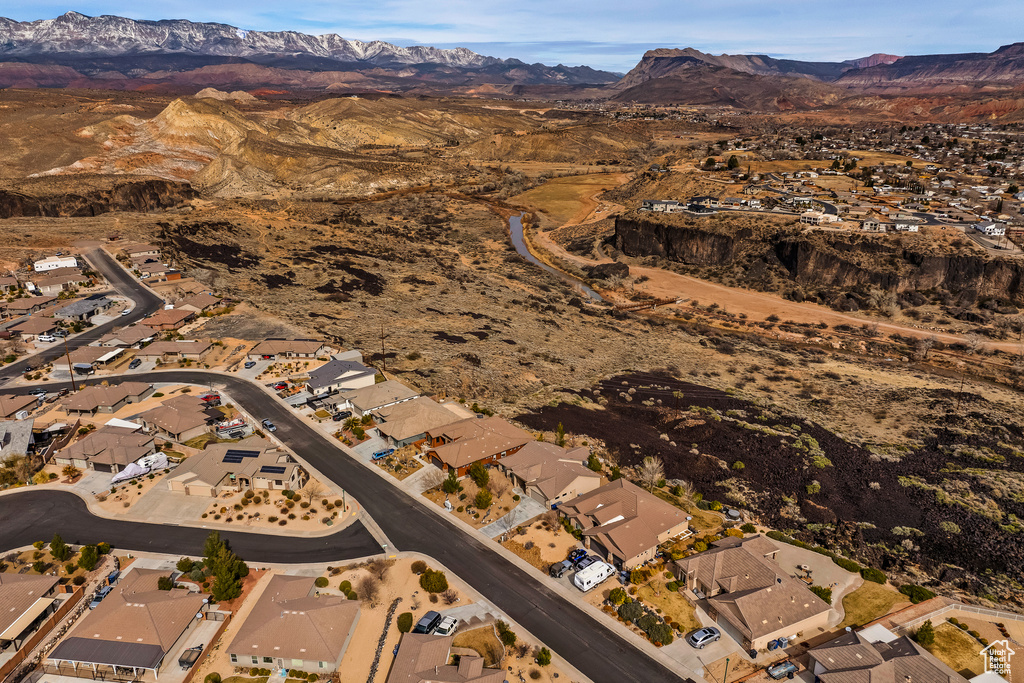 Birds eye view of property featuring a residential view and a mountain view