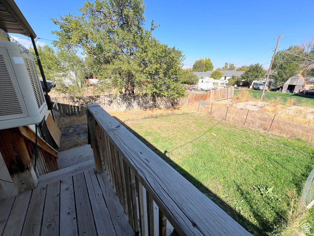 View of yard featuring fence