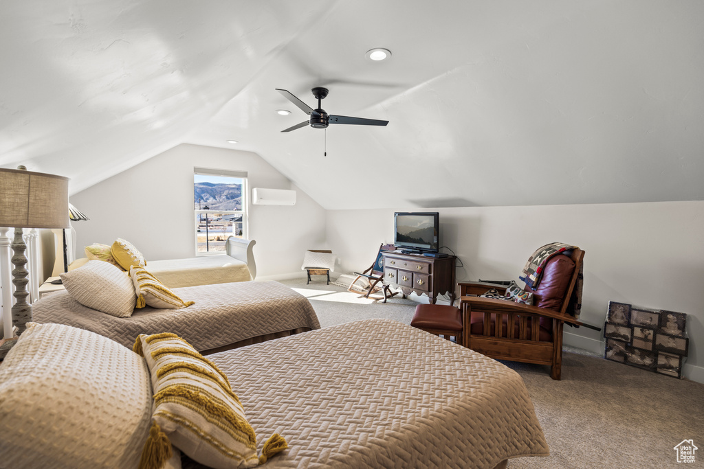 Bedroom with carpet floors, lofted ceiling, baseboards, and a ceiling fan