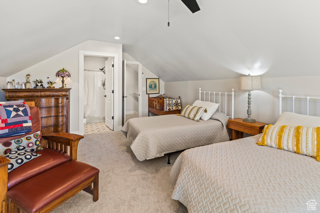 Bedroom featuring lofted ceiling, ensuite bath, ceiling fan, carpet floors, and recessed lighting