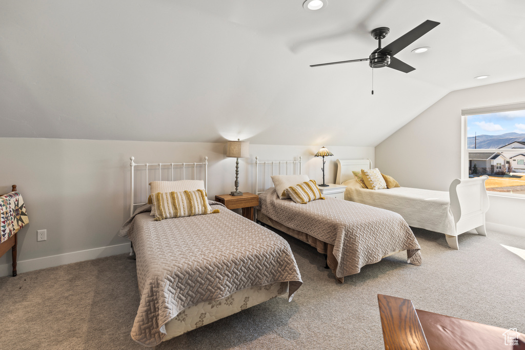 Bedroom with lofted ceiling, recessed lighting, carpet flooring, ceiling fan, and baseboards
