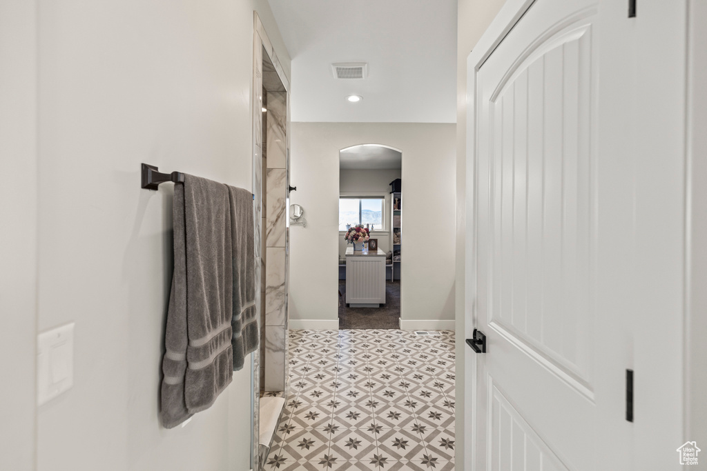 Bathroom featuring recessed lighting, tile patterned floors, visible vents, and baseboards