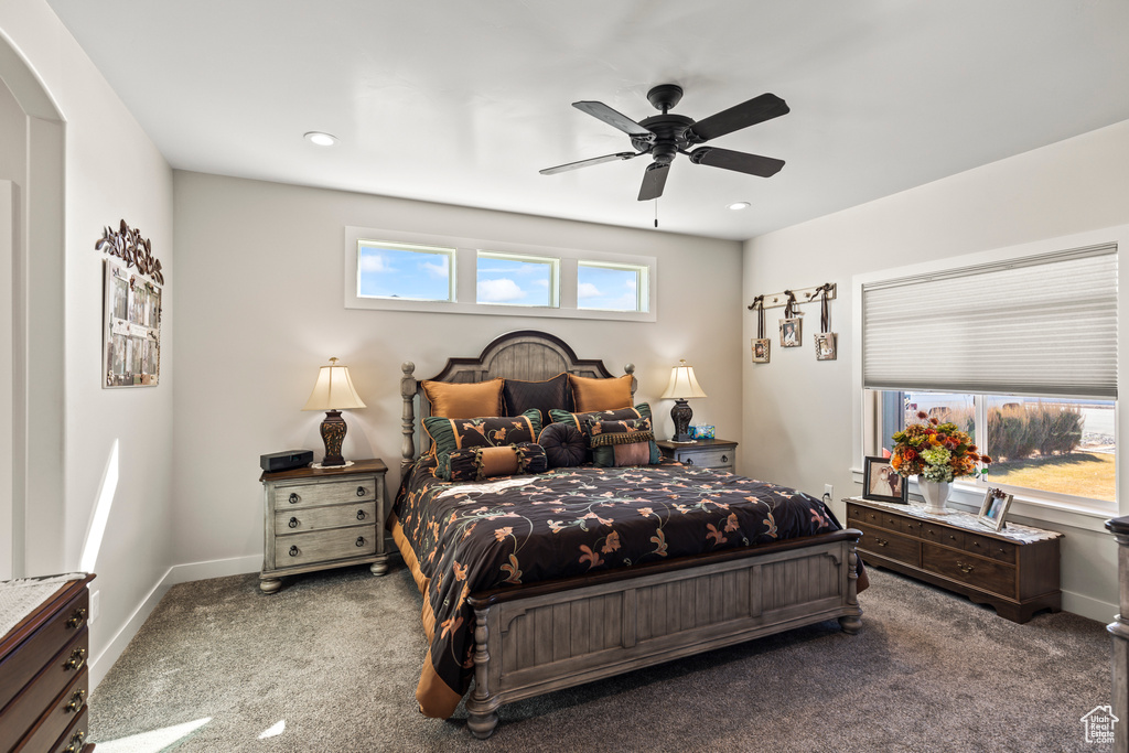 Carpeted bedroom with ceiling fan, recessed lighting, and baseboards