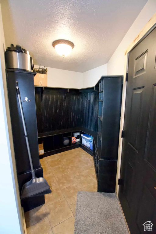 Interior space featuring light tile patterned flooring