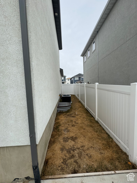 View of home\\\\\\\'s exterior with a fenced backyard and stucco siding