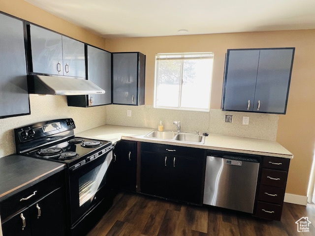 Kitchen featuring dark wood-style floors, a sink, black range with electric cooktop, dishwasher, and under cabinet range hood