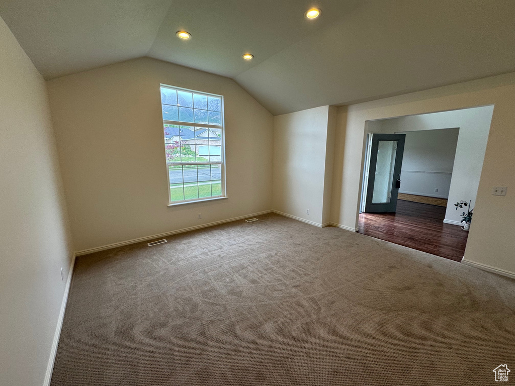 Bonus room with carpet flooring, vaulted ceiling, baseboards, and recessed lighting
