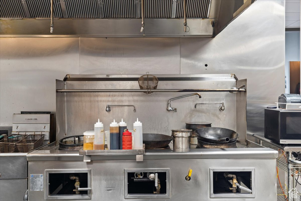 Kitchen featuring black microwave