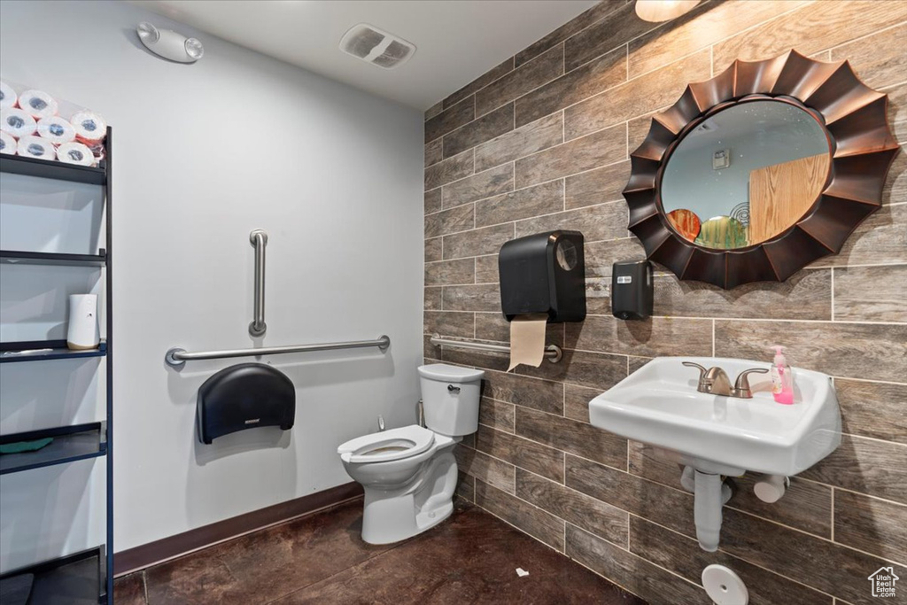 Bathroom with visible vents and toilet