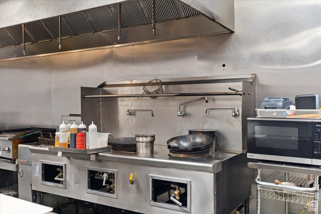 Kitchen with exhaust hood