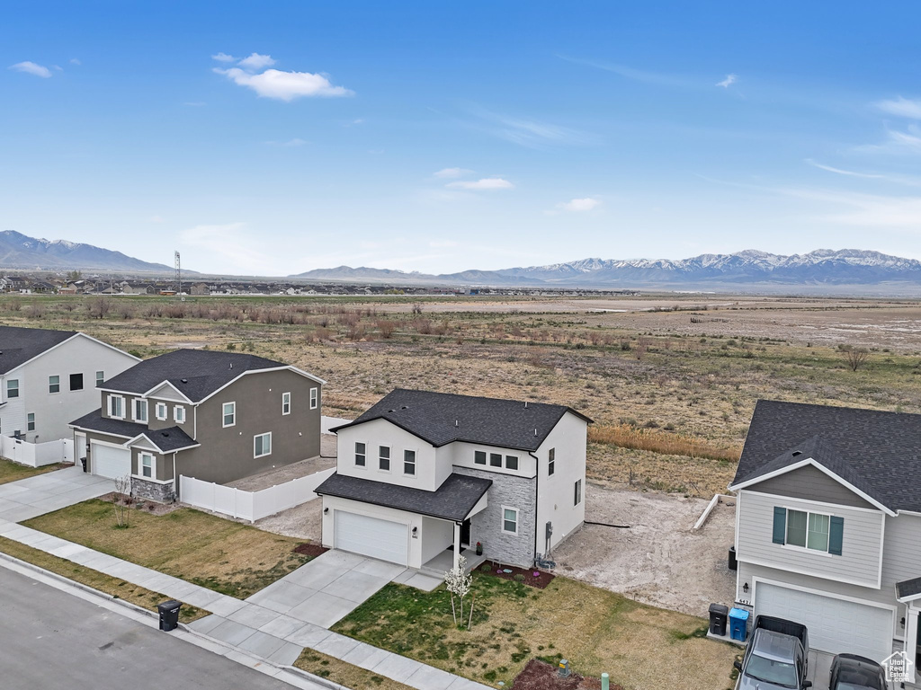 Birds eye view of property featuring a mountain view
